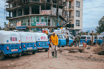 Image showing Traditional means of transport in Ethiopia, blue color auto rickshaw known as Tuk tuk on street