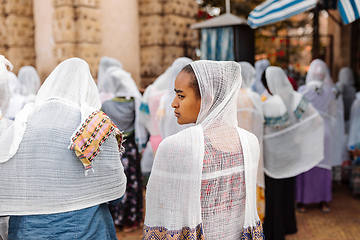 Image showing Orthodox Christian pilgrim at worship on the street during easter