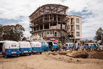 Image showing Traditional means of transport in Ethiopia, blue color auto rickshaw known as Tuk tuk on street