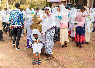 Image showing Orthodox Christian pilgrim at worship on the street during easter