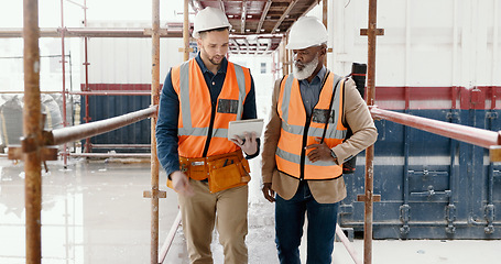 Image showing Construction, building and tablet with an architect and engineer on site planning on the internet with an online blueprint. Team, architecture and technology with business colleagues in collaboration