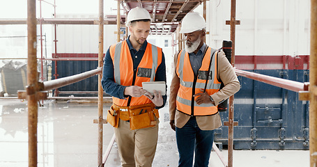 Image showing Construction, building and tablet with an architect and engineer on site planning on the internet with an online blueprint. Team, architecture and technology with business colleagues in collaboration