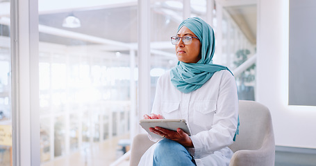 Image showing Senior, business woman in hijab with tablet, communication for company and networking with email and digital. Technology, Muslim executive in workplace and web design or digital marketing office