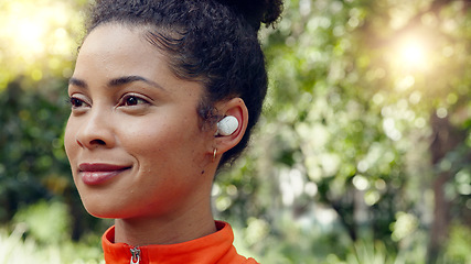 Image showing Brazilian woman, earphones and music in fitness workout, forest background training and nature park exercise. Face zoom, happy smile or runner with wellness sports goals, motivation and radio podcast