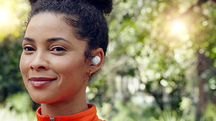 Image showing Brazilian woman, earphones and music in fitness workout, forest background training and nature park exercise. Face zoom, happy smile or runner with wellness sports goals, motivation and radio podcast