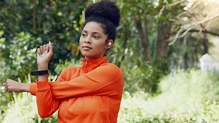 Image showing Black woman stretching in the park for fitness, health and wellness before a run. Exercise, sports and female athlete warm up training outside or in nature for mobility, flexibility and strength.