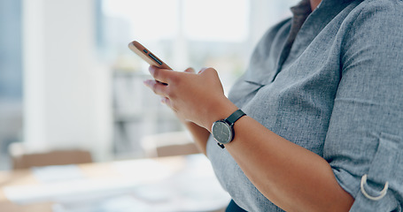 Image showing Business woman, hands and phone in social media texting for communication, chatting or browsing at the office. Hand of female employee typing, searching or online conversation on mobile smartphone