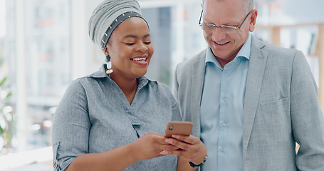 Image showing Executive black woman, senior man and phone in office for happiness, comic meme or conversation. African woman, boss and funny video on social media, internet or app while on break at startup company