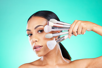 Image showing Beauty, makeup brush and portrait of woman in studio for skincare or grooming on green background. Face, skin and girl model relax with glamour tool, product or luxury makeover on isolated mockup