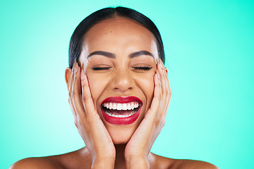 Image showing Face, makeup and excited with a model black woman in studio on a blue background for skincare or cosmetics. Beauty, lipstick and satisfaction with a young female posing to promote a cosmetic product