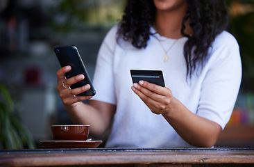 Image showing Woman, hands and phone with credit card for ecommerce, online shopping or purchase at coffee shop. Hand of female customer on smartphone for internet banking, app or wireless transaction at cafe