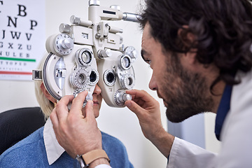 Image showing Eye exam, test and patient with doctor for vision at optometry consultation for lens or frame. Woman and man in healthcare with machine for eyes with health insurance and expert ophthalmology care