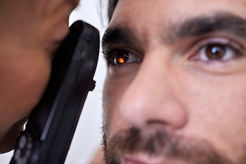 Image showing Eye exam, vision or laser test for a client with machine at optometry consultation helping his retina problem. Zoom, eyesight or doctor checking a man or customer with health insurance for wellness