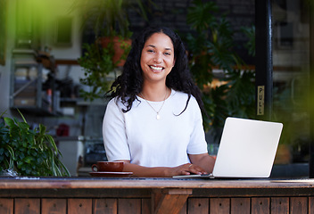 Image showing Cafe, portrait and woman typing on laptop for online project, email or sales report. Freelancer, remote worker and happy female with digital computer for writing, networking or planning at restaurant