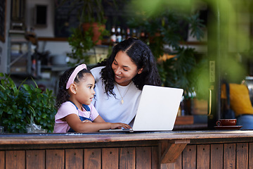 Image showing Learning, mother and girl with laptop at cafe for education and development online. Family, remote worker and happy woman teaching kid how to type on computer at restaurant, bonding and having fun.