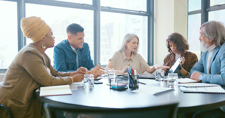 Image showing Business people, tablet and teamwork for planning, strategy and ideas by desk in modern office for goal. Corporate group, digital tech and finance team for brainstorming, vision or target in New York