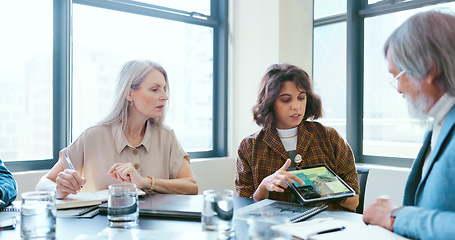 Image showing Business people, tablet and teamwork for planning, strategy and ideas by desk in modern office for goal. Corporate group, digital tech and finance team for brainstorming, vision or target in New York