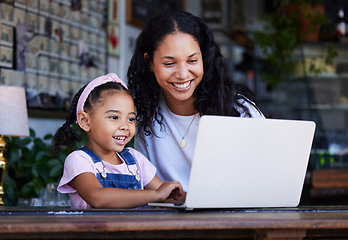 Image showing Girl, learning and mother with laptop at cafe for education and development online. Family care, remote worker or happy woman teaching kid how to type on computer at restaurant, bonding or having fun