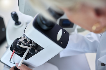 Image showing Microbiology, science and woman with microscope for research, studying bacteria and chemistry in a lab. Healthcare, analytics and scientist looking through a lens for medical analysis on a virus