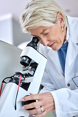 Image showing Doctor woman, ophthalmology and microscope for glasses tools to check and zoom on lens. Medical person at work for science, vision and health insurance working in lab, store or clinic for eye care