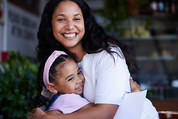 Image showing Love, hug and portrait of mother with girl bonding, having fun and smiling together at home. Family, support and mom hugging, cuddle or embrace with happy child or kid while enjoying time in house.