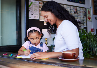 Image showing Drawing, learning and girl with mother at cafe with books, studying and art education. Family care, love and mama teaching kid how to color with crayons, having fun and bonding together in restaurant