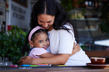 Image showing Love, mother and hug girl at cafe, bonding and enjoying quality time together. Portrait, family care and mama hugging, cuddle or embrace with happy daughter, kid or child, smiling and having fun.