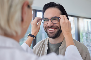 Image showing Optometrist, glasses and man with smile in store for vision, eyesight and optical frames. Happy customer face, spectacles and prescription lenses for eye care test, consulting or retail shop services