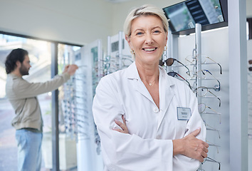 Image showing Glasses, optometrist and smile with portrait of woman for retail, healthcare and consulting. Shopping, ophthalmology and sale with senior optician in frame store for medical, designer and lens