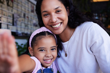 Image showing Portrait, girl and selfie of mother in home bonding, caring and having fun together. Love, family or face of mom with kid or child taking pictures or photo for social media or happy memory