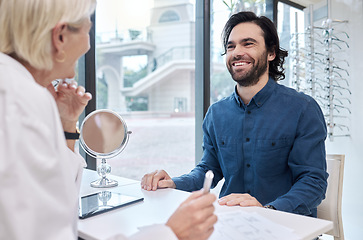 Image showing Senior doctor, help or man consulting for eyesight advice at optometrist or ophthalmologist with medical aid. Happy customer in optical exam to see or check vision health with a trusted optician