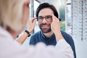 Image showing Optician, glasses and face of man in store for vision, eyesight and choice of frames. Optometrist help happy customer with lenses, eye care test and healthcare consulting for retail shop services