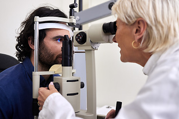 Image showing Patient, eye exam or test for vision with laser lens and doctor at optometry consultation. Man and woman healthcare person with machine for eyes, wellness and health insurance with expert care