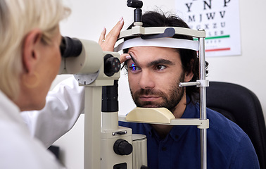 Image showing Patient man, eye exam or test for vision with laser lens and doctor at optometry consultation. Person and woman healthcare person with machine for eyes, wellness and health insurance with expert care