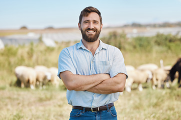 Image showing Man, portrait or arms crossed on livestock agriculture, sustainability environment or nature land in ideas, vision or hope. Smile, happy or confident farmer and animals growth or sheep farming