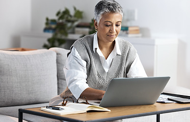 Image showing Business woman, laptop and home office while typing for online communication or networking. Senior freelancer entrepreneur person with internet connection writing email, planning or website research