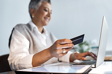 Image showing Businesswoman, credit card and laptop for ecommerce, finance or accounting investment in office. Closeup of worker, budget and financial payment on computer, fintech trading or digital online economy