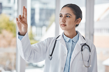 Image showing Healthcare, pointing fingers and doctor in a hospital after a wellness or health consultation. Medicare, hand and professional female medical worker standing with a gesture in a medic clinic.