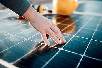 Image showing Hands, engineer and solar panel in construction for renewable energy, electricity or technology. Hand of electrician or technician feeling heated plates for quality, sun or testing power on building