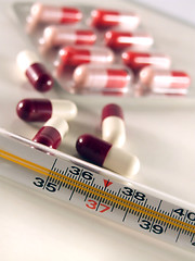 Image showing Thermometer and pills