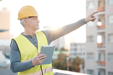 Image showing Digital tablet, city and male construction worker working on building for maintenance, renovation or repairs. Leadership, contractor and senior man industry worker at a town site with a mobile device
