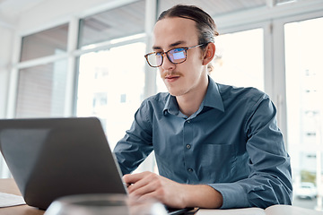 Image showing Laptop, internet and businessman in office for email, typing and creative, design and idea on mockup background. Website, search and man seo busy on online project, task and problem solving in London