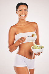 Image showing Salad, portrait and body of woman isolated on a white background for diet, lose weight and healthy food promotion. Green vegetables, fitness and model person in underwear for detox results in studio