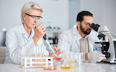 Image showing Science, collaboration and research with a medicine team working in a laboratory for innovation or development. Doctor, teamwork or medical with a man and woman scientist at work in a pathology lab