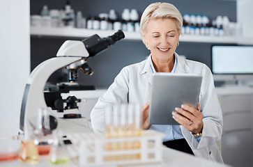 Image showing Science, tablet and research woman with microscope data analytics, test results and laboratory software management. Biotechnology, medicine and digital healthcare expert, scientist or senior person