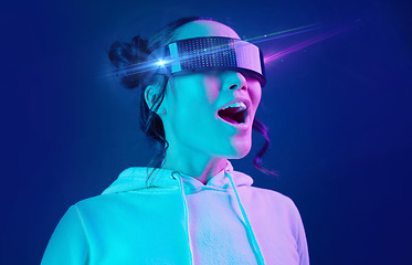 Image showing Metaverse, headset and shocked woman in a virtual reality in studio for futuristic innovation technology. Digital simulation, gaming and female with vr goggles for cyber tech by dark blue background.