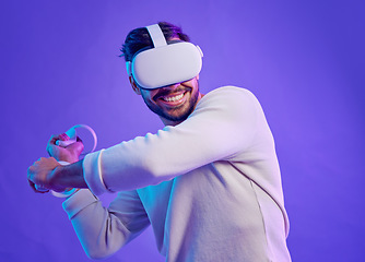 Image showing Man fight in metaverse, virtual reality glasses and futuristic game for vr gaming in cyber 3d world. Gamer person with hand controller for ar, digital experience and cyberpunk purple background app