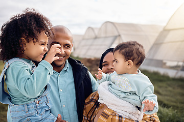 Image showing Family, agriculture and parents with children in field for bonding, relax and love in countryside. Sustainability, farming and happy mom, dad and kids together on farm for gardening, nature and calm