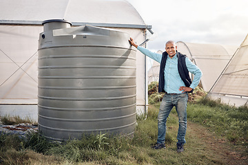 Image showing Man, portrait and water tank in farming liquid or soil hydration for vegetables, food and crops growth. Irrigation, storage and agriculture container for watering conservation, smile or happy farmer