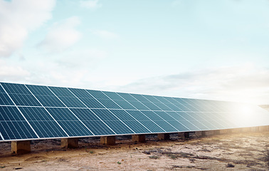 Image showing Solar panels, renewable energy and engineering for sustainability, eco friendly and clean electricity background. Agriculture, photovoltaic grid design and countryside sun on blue sky mockup or space